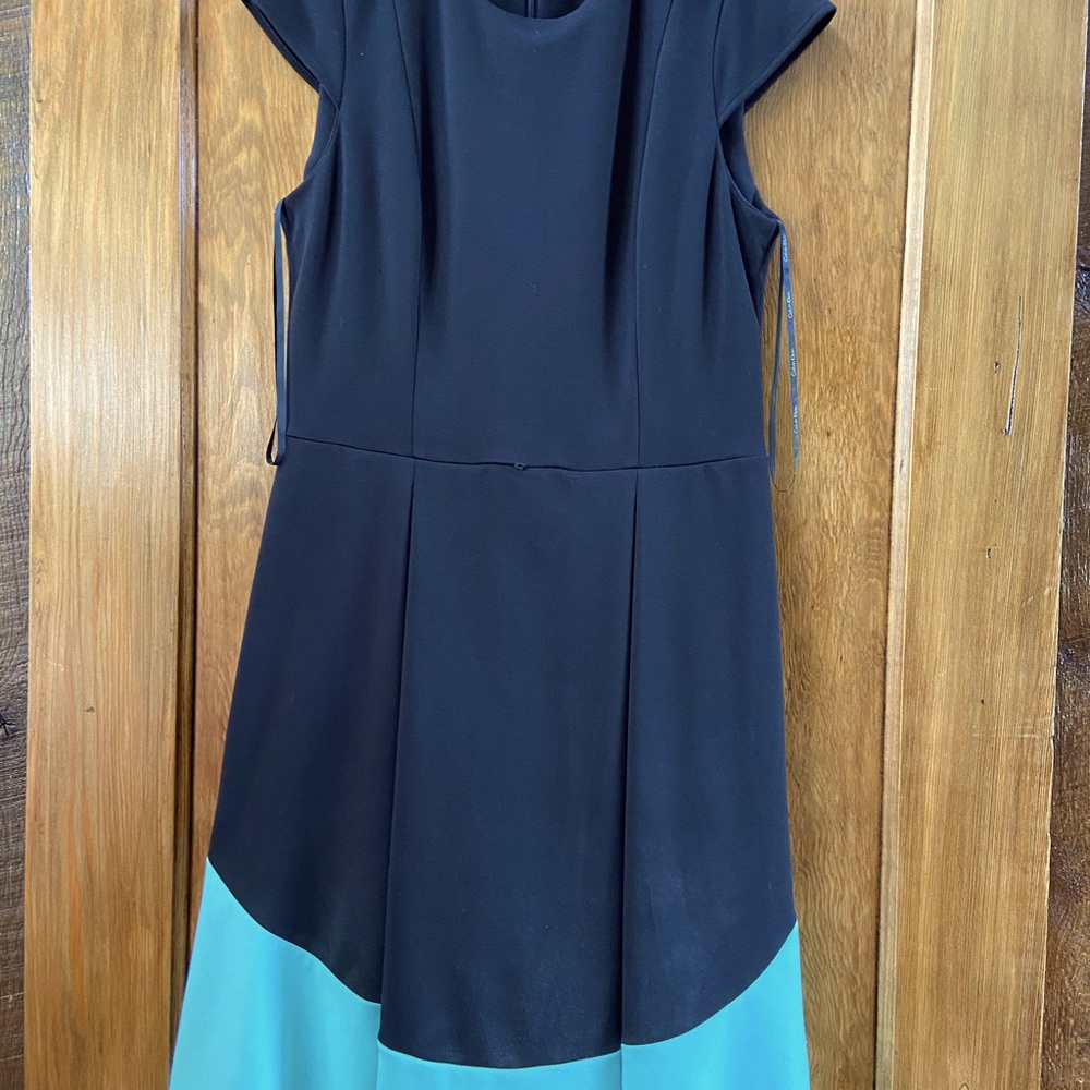 Calvin Klein dress black with teal/blue on bottom. Capped sleeves. Size 10